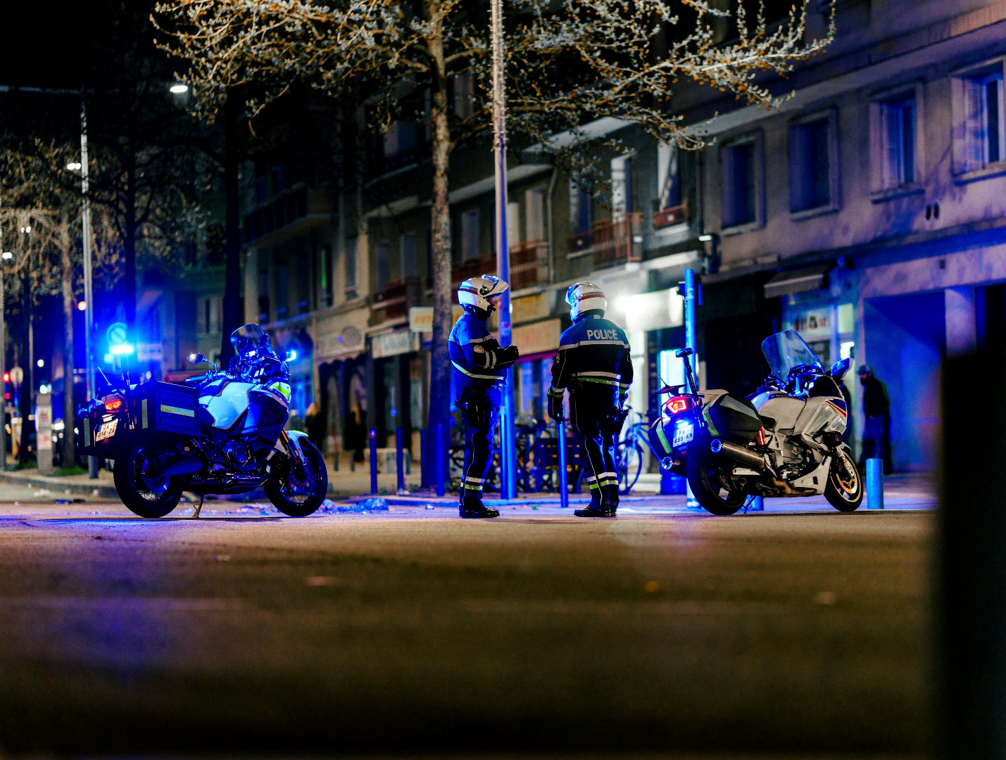 Security officer patrolling a property at night