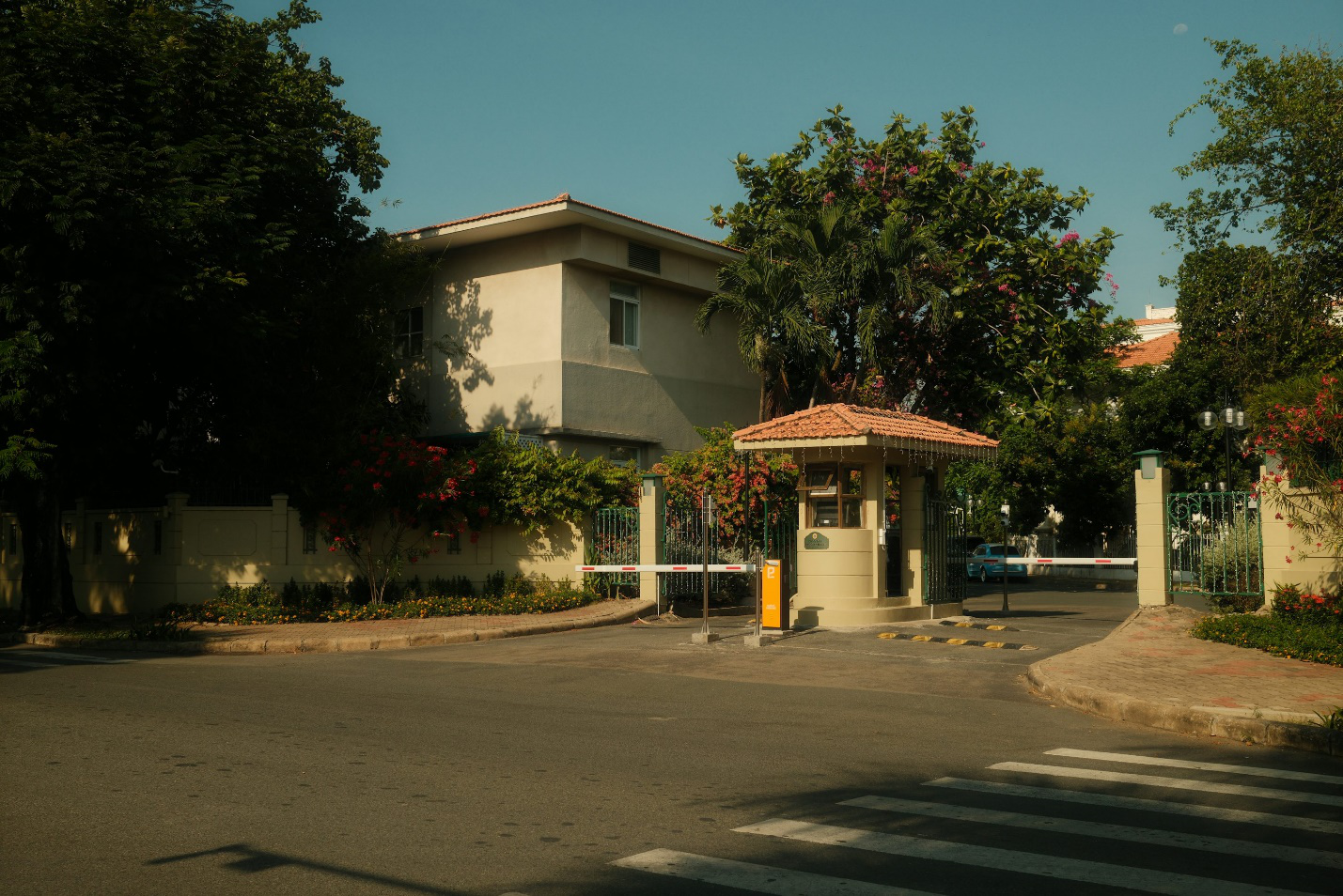 Security officer standing at a gated community entrance