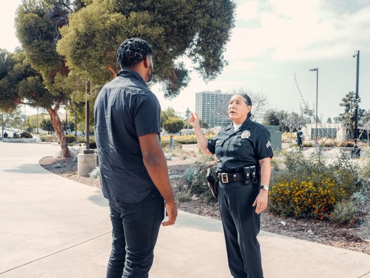 Security officer conducting patrol around a residential apartment community