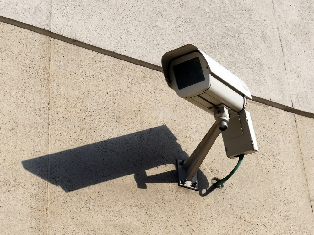 close-up of a CCTV camera on a building