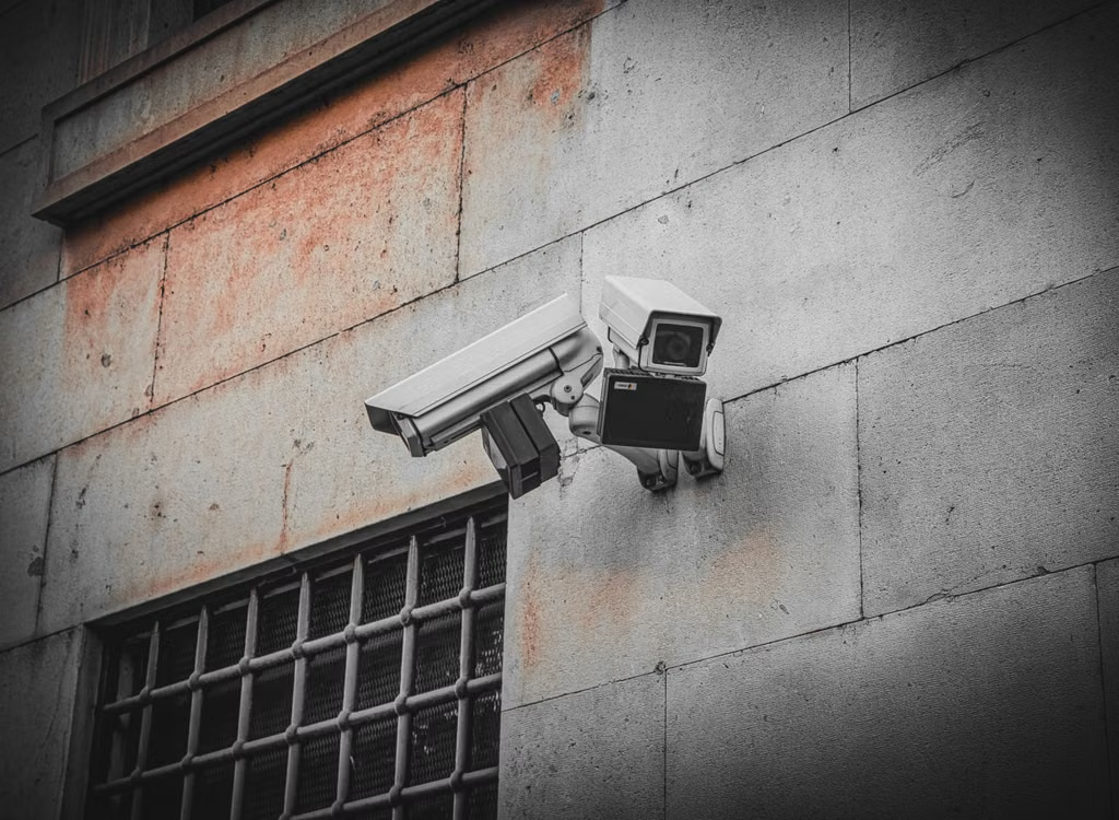 close-up of CCTV cameras on a wall