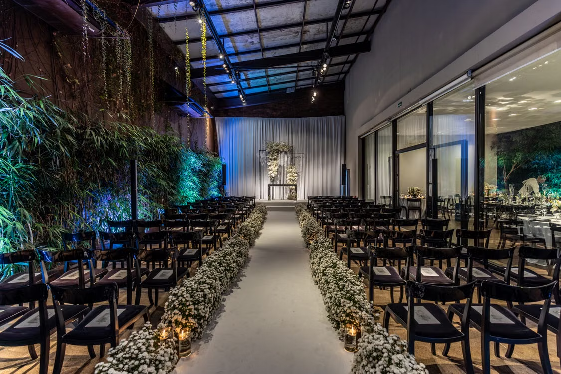 Well-organized event venue interior showing clear central pathway for guest circulation and movement.
